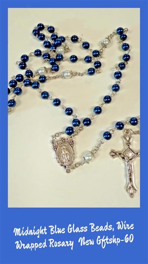 Handcrafted rosary featuring deep blue glass beads and precise wire wrapping for thoughtful prayer and reflection. It makes a refined gift or personal devotional piece, appropriate for daily use and special occasions. Midnight Blue Glass Beads, Wire Wrapped Rosary New Gftshp-60 - $11.99 - Click the link in our bio to shop now! 🛍️ #JourneysOfFaith #BobandPennyLord #CathoicStore #MidnightBlueBeads #WireWrappedRosary