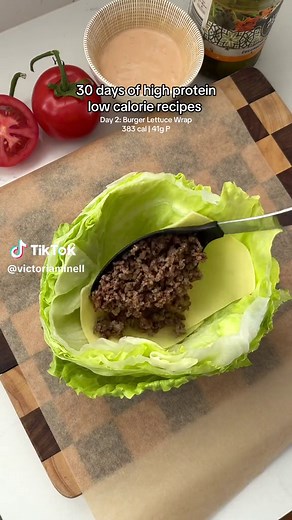 DAY 2: BURGER STYLE LETTUCE WRAP 🍔 with homemade Big Mac sauce. Day 2 of 30 high protein, low calorie recipes. Full recipe on my website.