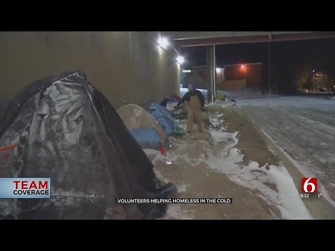 Volunteers Helping Homeless In The Cold During Severe Winter Weather