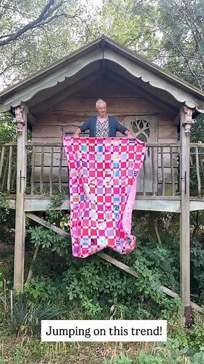 Kate Jackson on Instagram: "I’ve been seeing these quilt reveals for months and finally made my own! The Barbie Quilt unfurling over the balcony of the treehouse to the Rocky theme - well - this was a group effort. Anna filmed it, John suggested the soundtrack and … I made the quilt! Ha ha!! It makes me smile! #thelasthomelyhouse #quiltreveal #Barbiequilt"