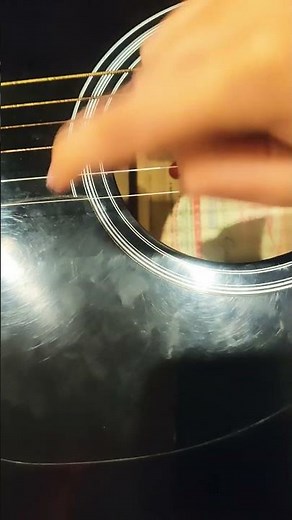How to make an acoustic guitar sound like an electric guitar .