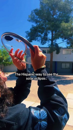 Hispanic Solar Eclipse Viewing with Pots and Pans