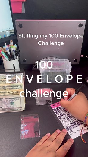 Stuffing my 100 Envelope Challenge. Envelopes labeled 1-100. Choose one per day, paycheck, or just as often as you can. Ending total should be $5,050 if you stuff the correct amounts. I choose to round up. #savingschallenge #100envelopechallenge #howtosave #cashstuffing