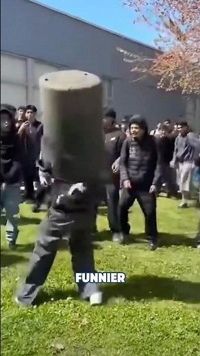 Garbage can thrown on kid during fight