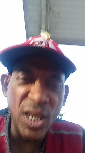 Casual Style with Red Cap and Shirt: A Video Insight