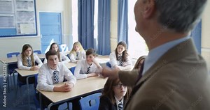 4K Angry teacher losing temper with disruptive pupil & sending him out of class