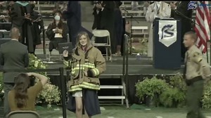 Daughter of Firefighter Killed in Fire Station Shooting Wears Her Father's Jacket at High School Graduation Ceremony