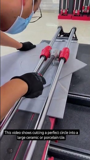 Using manual tile cutter, but rotates the tile around a central pivot point to score perfect circle