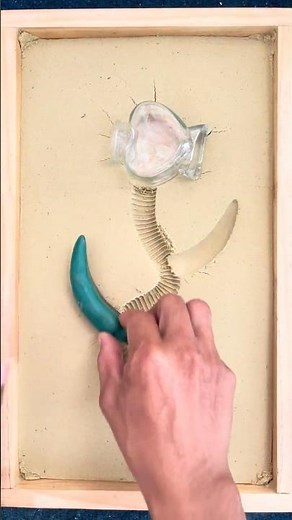 Unique Candle Design: Crafting a Green Heart Sculpture in Sand