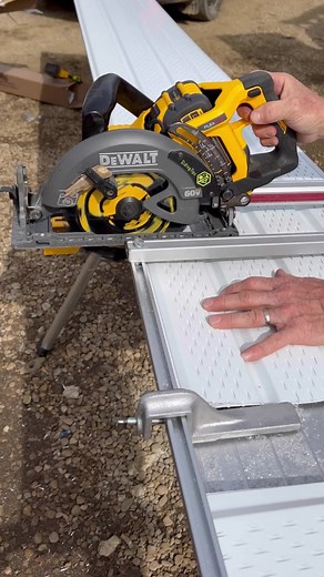 This is the Vanmark Sure Cut 45 siding/soffit cutting table. I mounted it onto the Dewalt mitre saw stand. In this video my friend is using it as he was doing the siding and soffit on his own house so I lent him my cutting table. It’s designed to be used with the blade flipped backward and so that you can cut going forward. I’ve always used a regular framing blade and cut backwards so that I don’t have to keep flipping the blade for when I’m cutting other materials like wood. Cutting backwards w