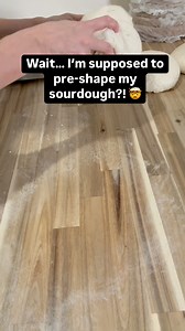 Pre-shaping is the secret to a loaf that holds its shape instead of spreading into a sad pancake 🍞✨ It helps organize the gluten, build structure, and sets you up for a beautifully shaped loaf. Here’s how I do it:👉 Using the flat side of my dough scraper, I gently push the dough into itself while guiding it with my other hand.👉 I move in a smooth, clockwise motion to create tension and shape it into a round.👉 Then, I let it rest uncovered for about 15 minutes before the final shaping. This l
