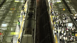 JAPAN : View of crowd of people at the train station in busy night rush hour. Japanese people, commuters and transportation concept video. Time lapse shot.