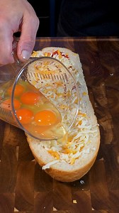 Making a sausage, egg, and cheese loaf