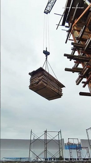 Crane Lifting: How a Tower Crane Hoists Heavy Plywood Stacks