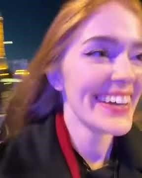 Romantic French kiss by lesbian friends near Eiffel Tower