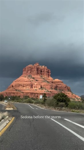 Stacey Butler on Instagram: "This afternoon Bell Rock beamed before another round of rain. The dark clouds only made her light brighter. Thank you, God, for another glorious day in Sedona. ✨🏜️✨ #sedona #rain #bell rock"