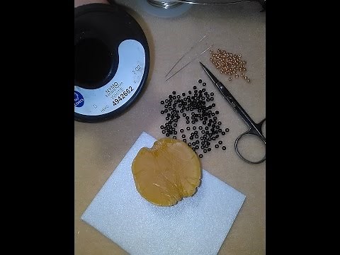 How to use 2 needles when beading.