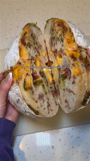 Jess Clark | Nutrition • Easy Recipes • UGC on Instagram: "(Day 86/365 on my new secret account) This bacon cheddar jalapeño sourdough is my most requested loaf by friends and family and it never disappoints!! Save this and follow for more sourdough recipes. Sourdough recipe: 350g room temp water 50-80g starter (I do a 12-13 hr overnight bulk fermentation) 500g bread flour 7g salt Inclusions: Sharp cheddar cheese (cubed) @tillamook Jalapeños @mezzetta Bacon crumble @costco Kirkland brand Gently