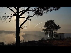 Massive wildfire destroys homes in Cyprus as police say two bodies found in burned-out car