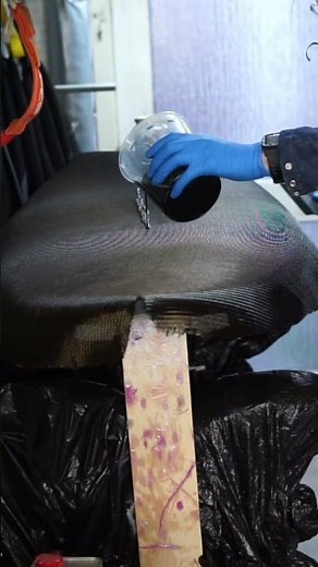 Carbon surfboard lamination with vacuum bag.