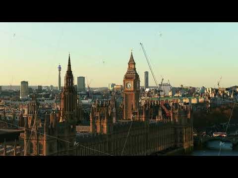 Golden hour illuminating Palace of Westminster and Elizabeth Tower, revealing London's historic