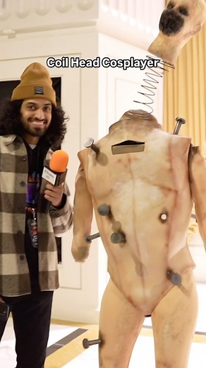 Shimmer ✨ on Instagram: "Classic interview with @mangoloo.cos ! As Coil head! at Magfest 🤙🏾 Saw her again across the country at Anime Expo as Godzilla 👀 (interview coming soon) #cosplayers #cosplaygirl #cosplayersofig #cosplayinggirl #coilhead #lethalcompany"