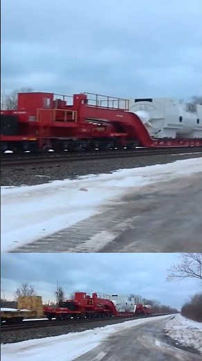 Giant sized CSX high and wide with caboose.