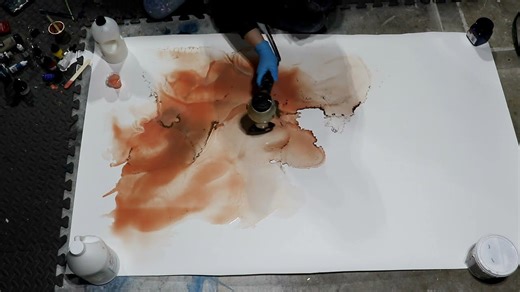 Elegant peach and gold wall art using acrylic pour techniques