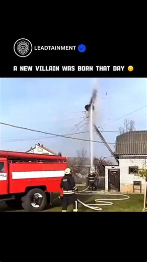 Leadtainment | Breaking News | Entertainment on Instagram: "This video is a humorous “villain origin story” meme that depicts a stork’s transition from a victim to a dramatic antagonist after firefighters use a high-pressure hose to remove its large nest from a utility pole for safety reasons. The footage shows the nest being destroyed and the bird subsequently returning to the empty pole, where it strikes a broad, imposing stance with its wings spread. To complete the joke, the video uses the “