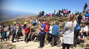 Snowdon. The roof of Wales. Spectacular sights. Unparalleled views. And people. LOTS of people! An idea is taking hold at the Snowdon Partnership - could walkers donate £1 each for the upkeep of Wales' greatest mountain? Find out more on BBC Radio Cymru's Manylu » http://bbc.in/1Ny0DwW | BBC Cymru Wales