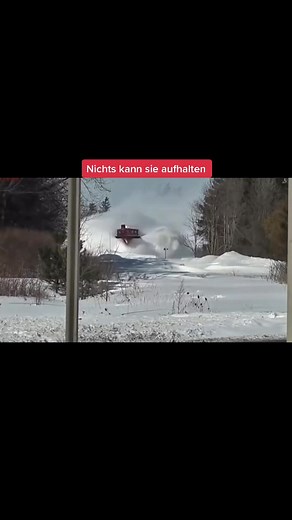 Powerful Snowplow Truck Clears Heavy Snow in Motion