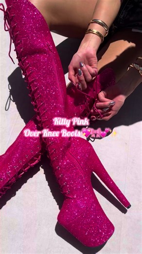 The Glitterati Xtra Over Knee Boots in Kitty Pink 😻 With Built-In Knee Protection 💓 🔗 Shop Now - Link in Bio #hellaheels #kittypink