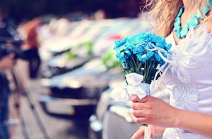 Young Bride with Blue Flowers on the Eve of Marriage on the Background of a Car Wedding Tuple and Video Camera Stock Photo - Image of bouquet, flower: 143914286