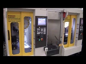 Bottle Opener Machining with Dual FANUC ROBODRILLs & FANUC LR Mate 200iD Robot