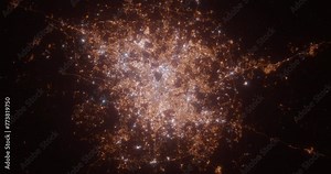 Hyderabad (India) aerial view at night. Top view on modern city with street lights. Camera is zooming out, rotating clockwise