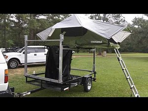 Kayak trailer and rooftop tent.