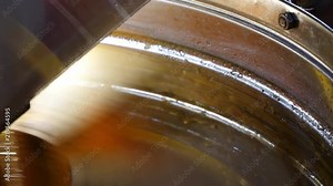 Honey extraction with honey centrifuge close-up. 4K UHD