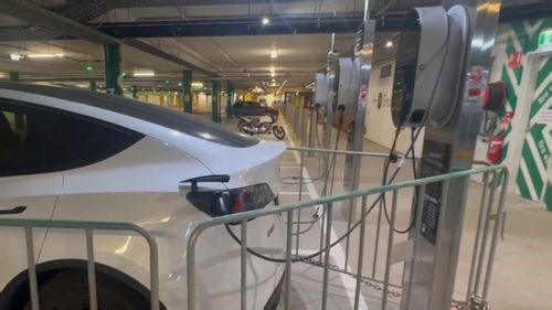 Shopping centre cages Tesla after it overstays its welcome