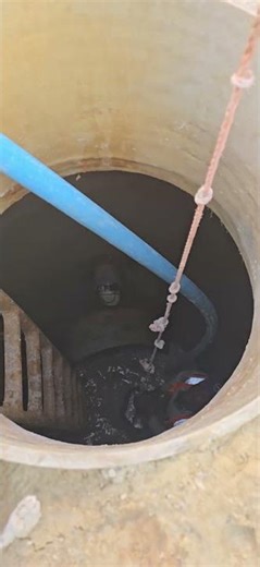 The manhole is finally being cleaned after complete pipe line,,