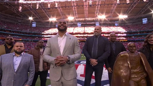 Andrew Whitworth presents Dak Prescott with Walter Payton Man of the Year award