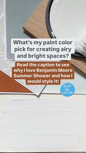 Karolina De Costa on Instagram: "A breezy coastal paint color If you’re looking for that airy, light and cheerful wall paint color try @benjaminmoore Summer Shower. This soft shade of blue has a touch of green which keeps it from feeling cold. It has just enough gray to soften but not enough to take away from its crisp and breezy feel. For woodwork pair with Benjamin Moore Steam for a clean contrast that won’t feel cold or stark. Accent with navy, light woods and brass hardware. How would I styl