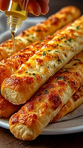 🧄🧀 3-Ingredient Cottage Cheese Garlic Breadsticks 🍞✨ Crispy edges, cheesy centers, and full-on garlic flavor — all with just three ingredients! 😍 These high-protein breadsticks are the perfect low-carb snack, side, or party bite. Quick, simple, and addictively delicious! 💪💛 Ingredients: 1 cup cottage cheese 🧀 2 large eggs 🥚 ½ cup shredded mozzarella cheese 🧈 (Optional but highly recommended: ½ tsp garlic powder pinch of Italian seasoning 🌿) Instructions: Preheat & Prep: 1.1. Preheat ov