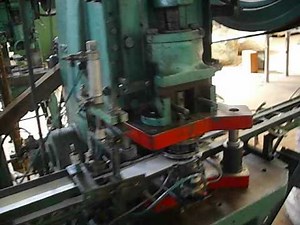 Alimentador automático de Prensa Excêntrica.