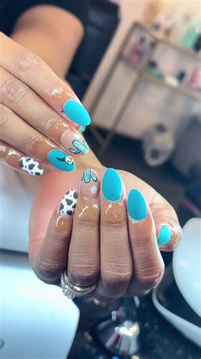 Almond Shape Nails: Cow Print & Fierce Bull Design