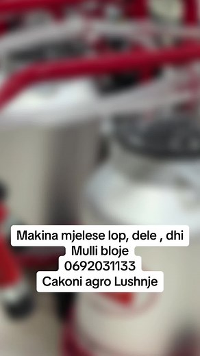 Efficient Red and Silver Milking Machine Overview