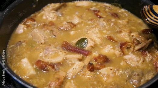 Learn to cook lechon paksiw from scratch using special ingredients and traditional methods in a home kitchen setting