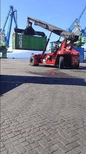 The container stacking process is the activity of systematically arranging and stacking containers.