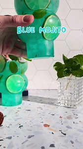 This blue mojito is a refreshing and unique take on a classic cocktail💙 It’s packed with lime juice, blue curaçao, mint, and rum for a colorful spring drink! #bluemojito #mojito #cocktails #cocktailrecipes | Crowded Kitchen