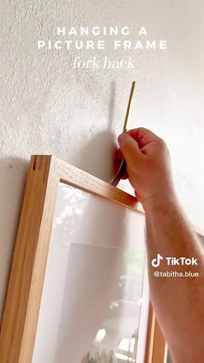 Hanging pictures the easy way!!! 🫶🏼 Once you’ve got that nail in the wall… are you like me and usually scrape the picture against the wall about 20 times until it catches?? 🤪😭 We are slowly putting together a couple more gallery walls in our home (and finally printing more pictures 🙌🏻🙌🏻, and using this fork hack to catch the wire has been SO helpful!!! Ps. If your frame doesn’t have wire, you can easily add it — makes hanging frames, adjusting frames, and switching out art so much easier
