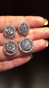 4.8K views · 258 reactions | Stunning CZ 2 layer swarovski crystal earring in silver. Back in stock. Price:2400 Inbox of call at 01715232291 to book your pair today. Limited quantities available. | Sunshine's Collection | Facebook